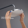 Sistema de ducha Duravit con termostato y repisa de vidrio